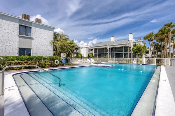 Large community pool overlooking Venice Beach and the Gulf
