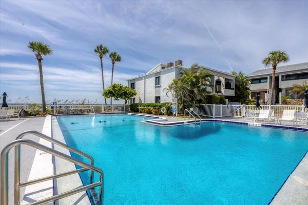 Large community pool overlooking Venice Beach and the Gulf