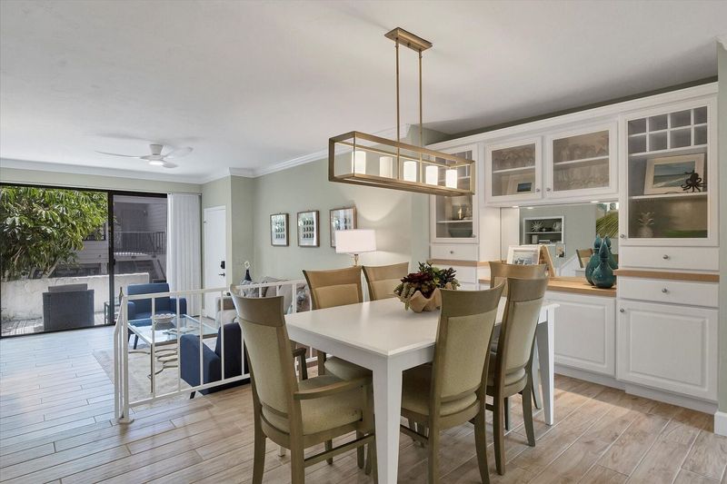 Dining area overlooking living room. Dining table seats 6