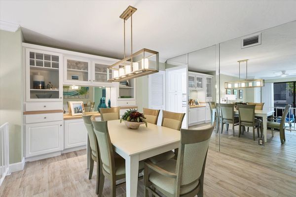 Dining area overlooking living room. Dining table seats 6