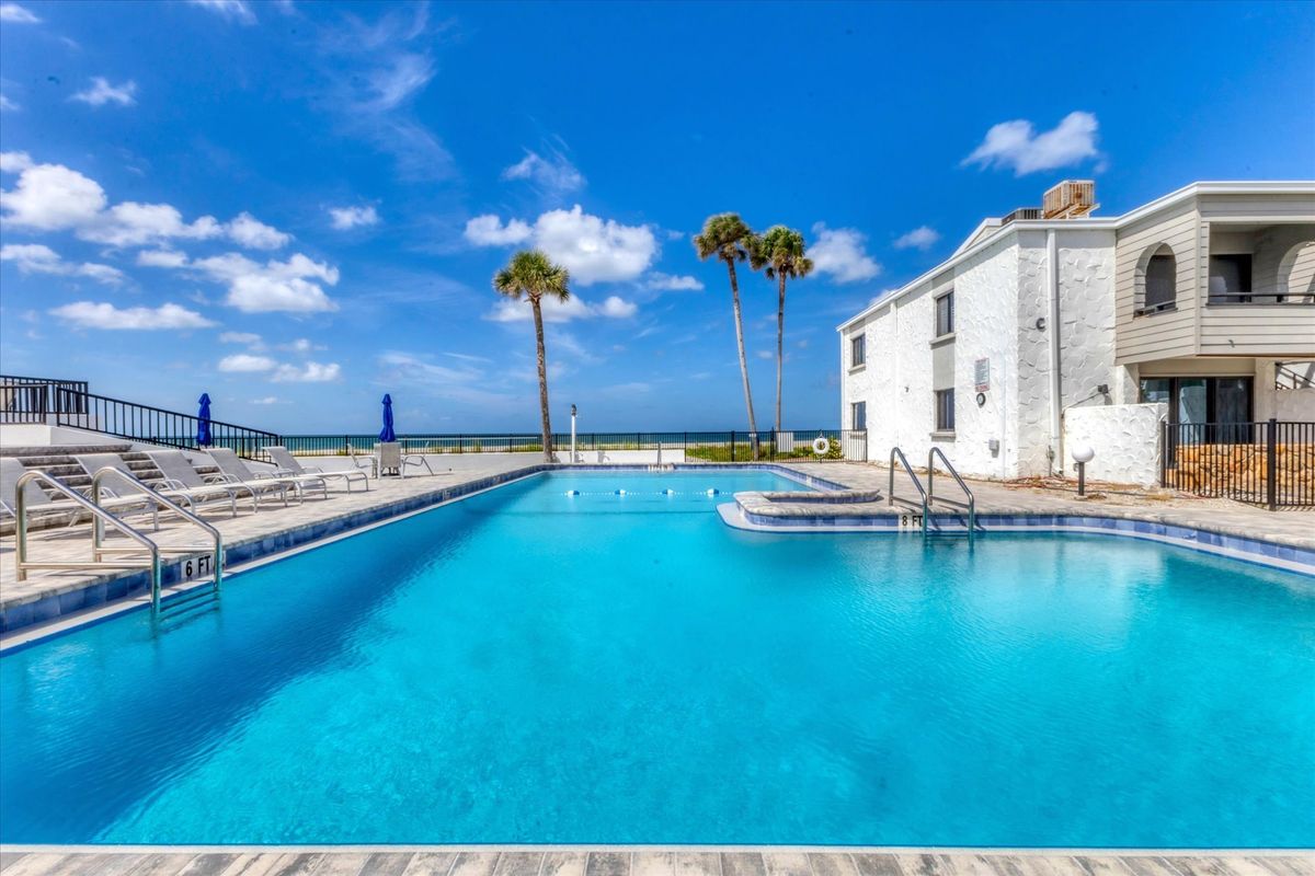 Large community pool overlooking Venice Beach and the Gulf