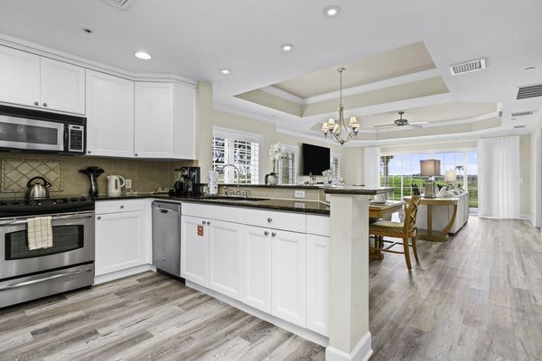 This property offers a blend of peaceful seclusion and contemporary elegance, all while being just moments away from a host of premier amenities and attractions