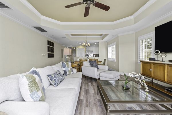 Gather in the spacious living room, designed with comfort in mind and ideal for entertaining guests or enjoying family time