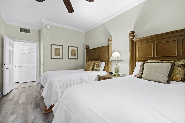 This bedroom promises a serene escape with its plush and cozy design