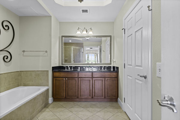 Enjoy the convenience of an en-suite bathroom featuring a walk-in shower for a refreshing start to your day