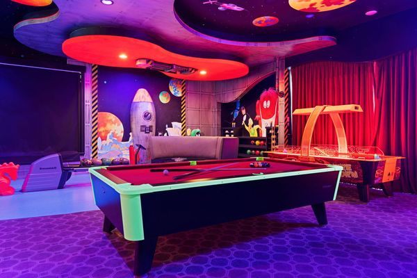 This games room will have enough space for the entire family to enjoy some friendly competition