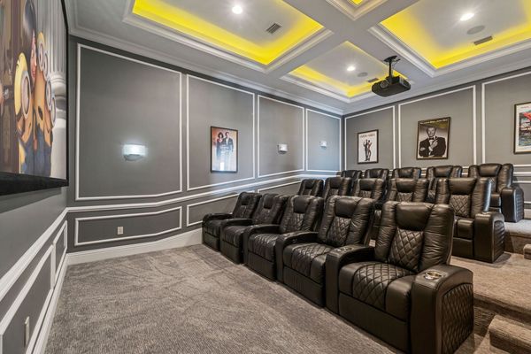 Complete with plush reclining chairs and state-of-the-art surround sound for an immersive cinematic experience.