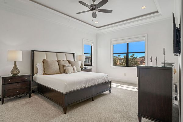 This King bed promises a serene escape with its plush and cozy design