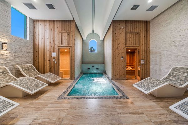 Rejuvenate in the sauna within our fitness center, offering a serene escape to relax your muscles and enhance your wellness routine