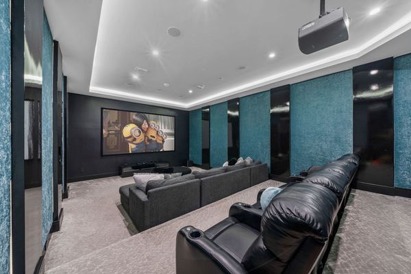 Movie Theater with Acoustical Walls Lined with Velvet and LED Lighting