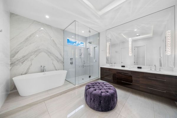 Bathroom 3 with Book-match Marble Wall behind Tub