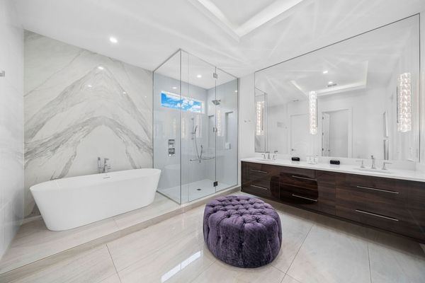 Bathroom 3 with Book-match Marble Wall behind Tub