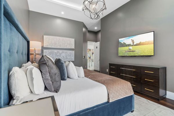 Bedroom 5 With King Size Bed, Loveseat, and 60 inch TV