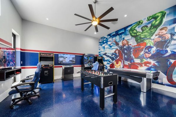 Arcade with Air Hockey, Foos Ball, Two Multicades with 120 Video Games, Golden Tee, and Driving Game