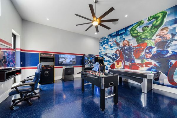 Arcade with Air Hockey, Foos Ball, Two Multicades with 120 Video Games, Golden Tee, and Driving Game