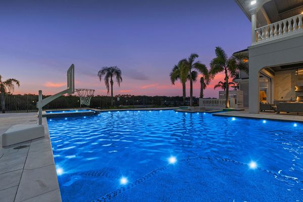 The privacy of this home is one-of-a-kind with simply nature surrounding your outdoor entertainment area and pool deck