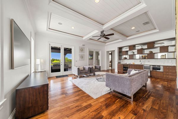 Gather in the 2nd floor loft area, a versatile space perfect for lounging, watching movies, or enjoying casual conversations