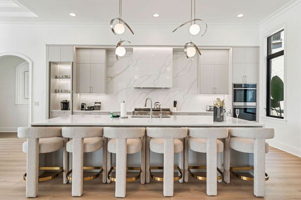 Sit down at the bar top whilst the family cooks up some home cooked meals