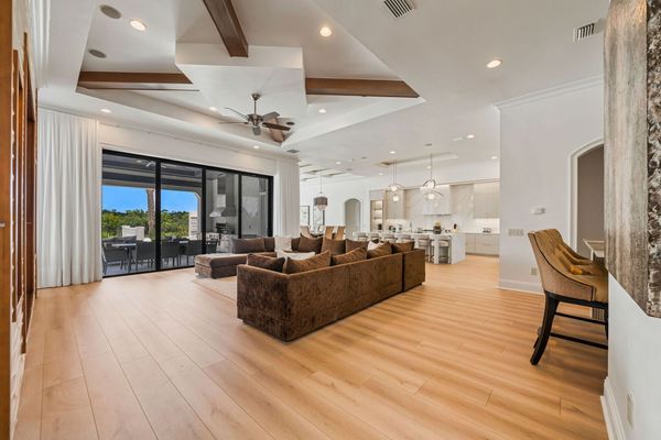 This modern themed living area features a fantastic open concept floorplan perfect for the larger group vacations