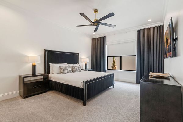 This luxurious bedroom features a King bed
