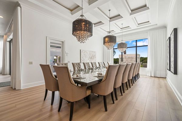 Dine in style at the formal dining table, which comfortably seats 10 guests for any occasion