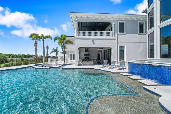 The privacy of this home is one-of-a-kind with simply nature surrounding your outdoor entertainment area and pool deck