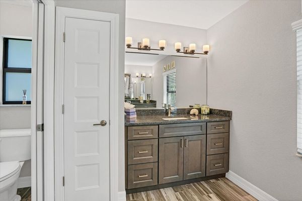 Beautiful primary bathroom with walin shower and double vanities