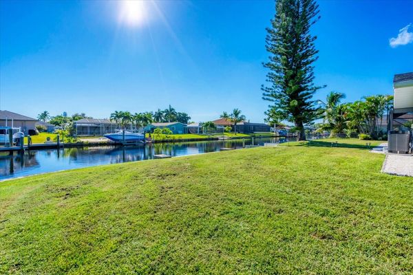 Large backyard leading to dock and canal (Boat lift not available)