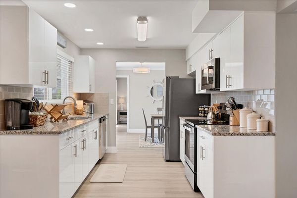 Beautiful, fully-equipped kitchen with stainless-steel appliances