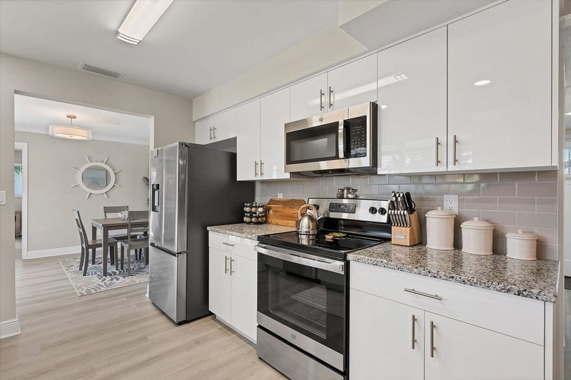 Beautiful, fully-equipped kitchen with stainless-steel appliances