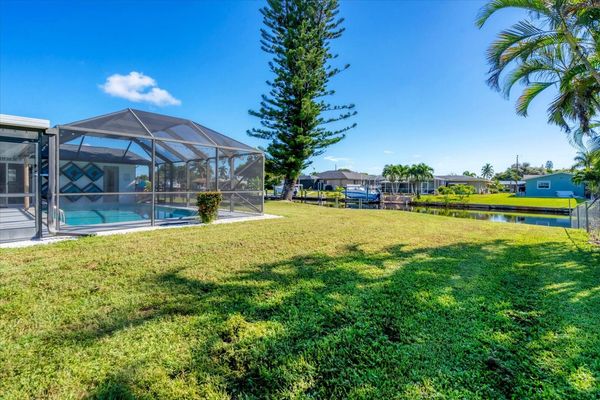 Large backyard leading to dock and canal (Boat lift not available)