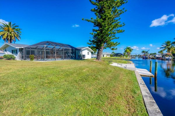 Large backyard leading to dock and canal (Boat lift not available)