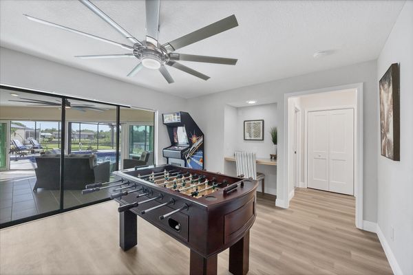 Game Room with Foosball Table and Arcade Game