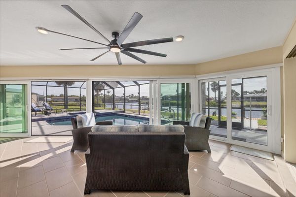 Covered lanai overlooking the pool and canal