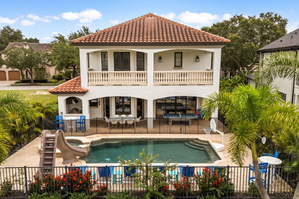 The privacy of this home is one-of-a-kind with simply nature surrounding your outdoor entertainment area and pool deck