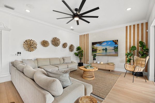 The space flows seamlessly into the kitchen, which is fully equipped for any culinary needs, whether you're preparing a full meal or just a quick snack.