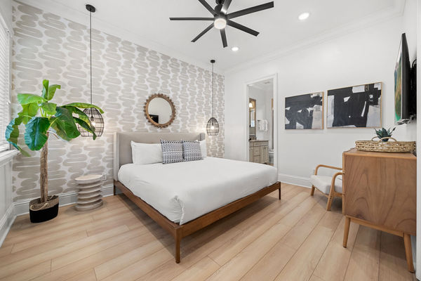 Retreat to the serene master bedroom, a spacious haven complete with luxurious furnishings and a tranquil ambiance