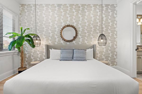 Rest easy after a long day in this plush King bed, offering the ultimate in comfort and relaxation