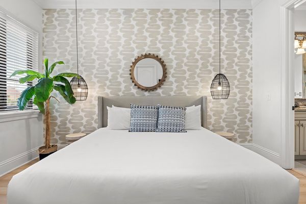 Rest easy after a long day in this plush King bed, offering the ultimate in comfort and relaxation