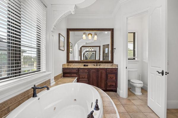 Enjoy the convenience of an en-suite bathroom featuring a walk-in shower for a refreshing start to your day