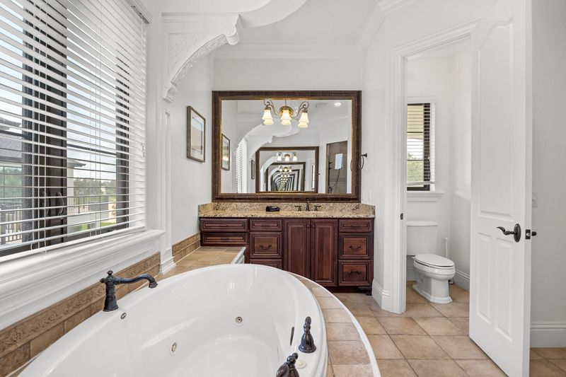 Enjoy the convenience of an en-suite bathroom featuring a walk-in shower for a refreshing start to your day