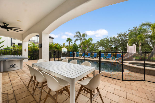 Comfortable outdoor seating under the covered lanai