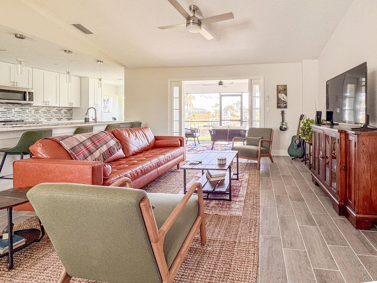 Welcome to your waterfront oasis in the highly sought-after Bird Section of Punta Gorda Isles.