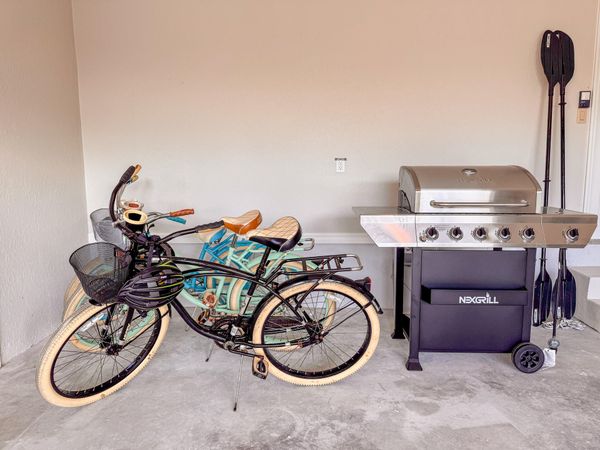 3 bicycles and BBQ grill
