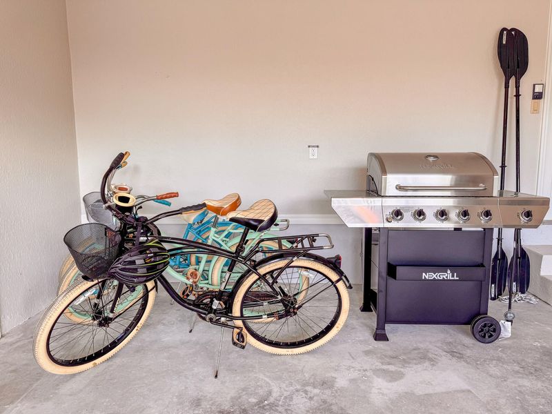 3 bicycles and BBQ grill