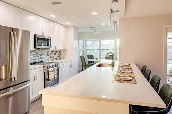 Bright, open, fully-equipped kitchen. Kitchen table seats 4 with the kitchen island seating an additional 4