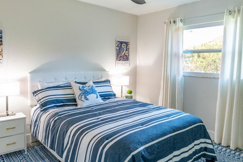 Guest bedroom 1 features one queen bed