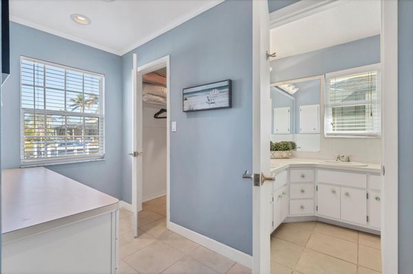 Primary bathroom with large walk-in shower and double vanities