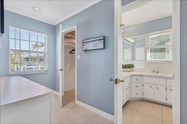 Primary bathroom with large walk-in shower and double vanities