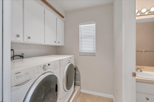 Laundry room with full-size washer & dryer